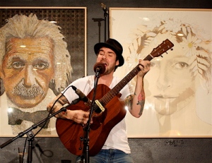 Whitmore performing at the Java House in Iowa City | Photo by Julie Staub